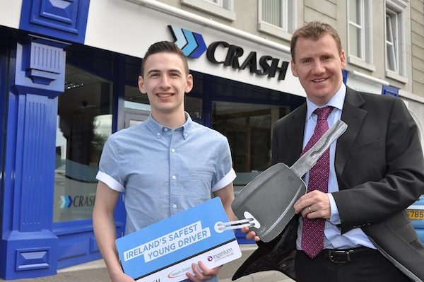 Tony McKeown, from Crash Services, congratulates Dean Zerai, 18, who was recently named Ireland's Safest Young Driver Crash Services, Newry, Co.Armagh